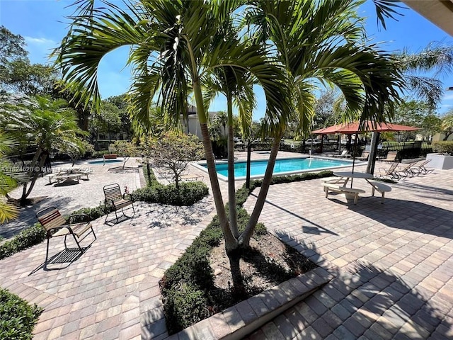 660 Cypress Club Way Unit F11, Deerfield Beach, FL 33064 - community pool with a patio