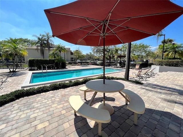 660 Cypress Club Way Unit F11, Deerfield Beach, FL 33064 - community pool with a patio area