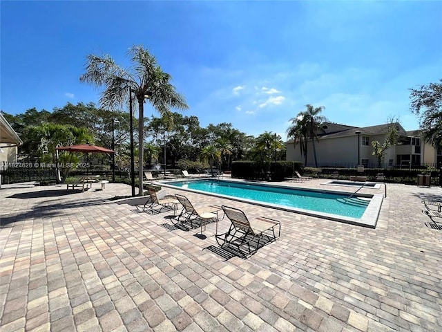 660 Cypress Club Way Unit F11, Deerfield Beach, FL 33064 - community pool featuring a patio area