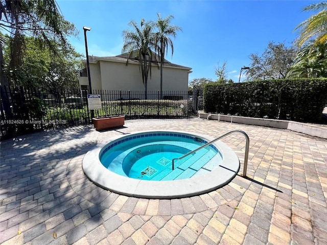 660 Cypress Club Way Unit F11, Deerfield Beach, FL 33064 - view of swimming pool featuring a hot tub