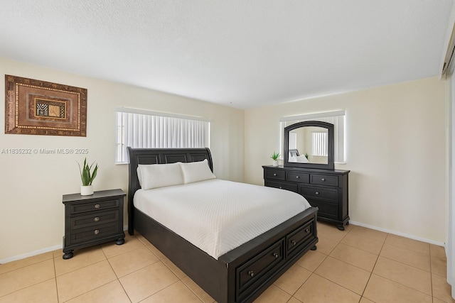 8103 NW 27th St Unit 1, Coral Springs, FL 33065 - bedroom with light tile patterned flooring