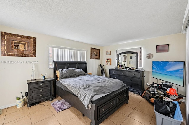 8103 NW 27th St Unit 1, Coral Springs, FL 33065 - bedroom with a textured ceiling and light tile patterned floors