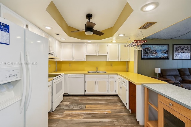 8103 NW 27th St Unit 1, Coral Springs, FL 33065 - kitchen with white appliances, exhaust hood, ceiling fan, light countertops, and recessed lighting