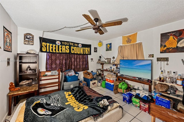 8103 NW 27th St Unit 1, Coral Springs, FL 33065 - tiled bedroom with a textured ceiling and ceiling fan