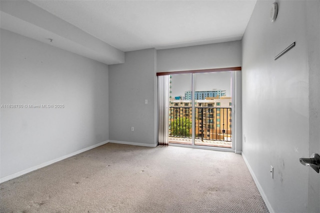 3410 Coral Way Unit 904, Miami, FL 33145 - spare room with carpet flooring and a smoke detector