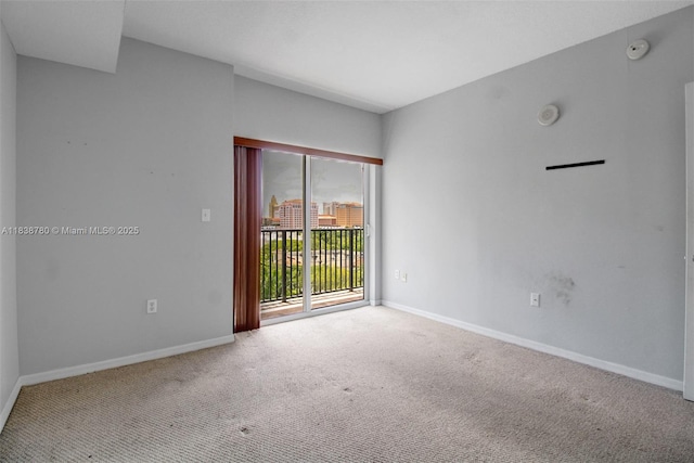 3410 Coral Way Unit 904, Miami, FL 33145 - empty room with carpet and baseboards