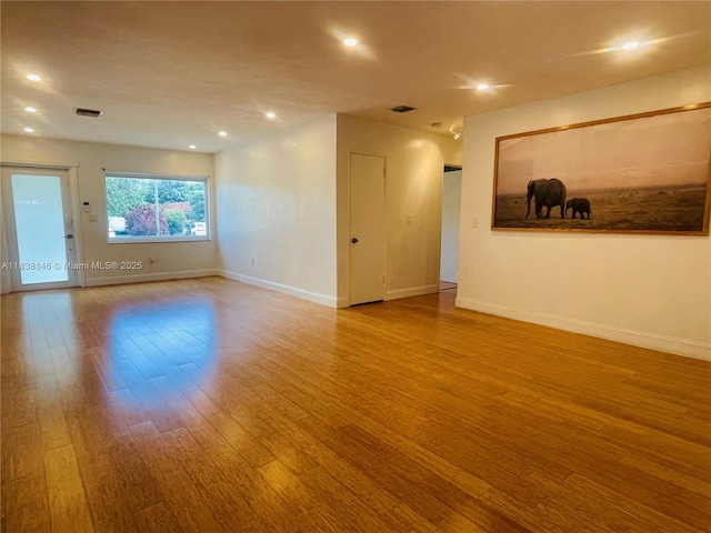 1930 NE 178th St, North Miami Beach, FL 33162 - empty room featuring wood finished floors and recessed lighting