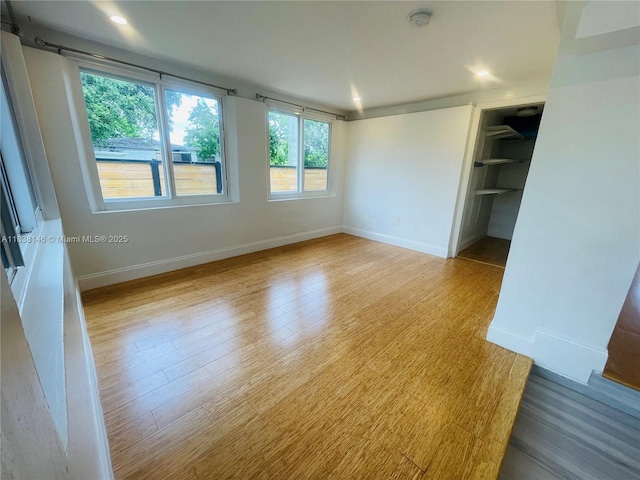 1930 NE 178th St, North Miami Beach, FL 33162 - unfurnished room featuring wood finished floors and a smoke detector