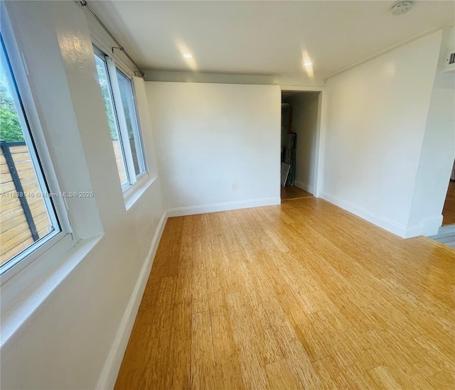 1930 NE 178th St, North Miami Beach, FL 33162 - unfurnished room featuring wood finished floors and a smoke detector