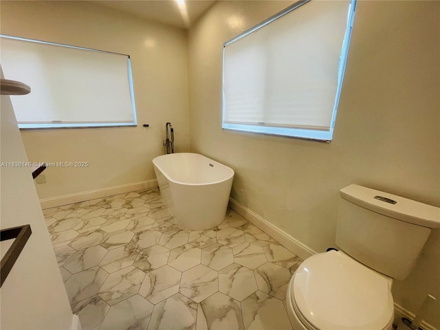1930 NE 178th St, North Miami Beach, FL 33162 - full bath featuring a soaking tub and marble look tile flooring