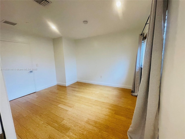 1930 NE 178th St, North Miami Beach, FL 33162 - unfurnished room with light wood-style flooring and baseboards