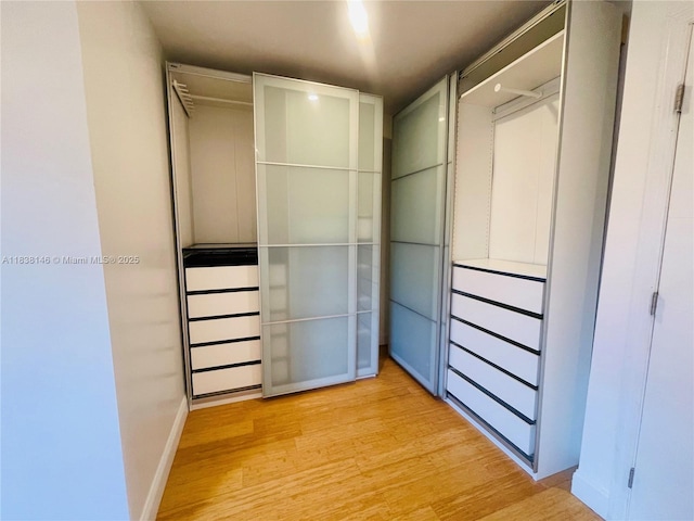 1930 NE 178th St, North Miami Beach, FL 33162 - walk in closet with wood finished floors