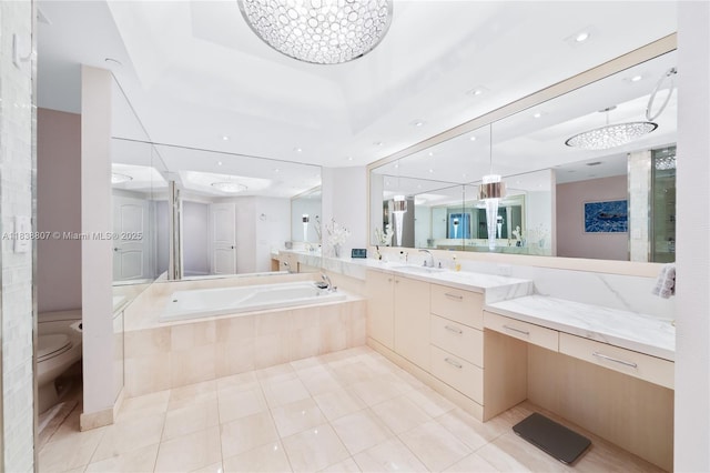 2000 Island Blvd Unit 2409, Aventura, FL 33160 - bathroom with a garden tub, vanity, tile patterned flooring, and recessed lighting