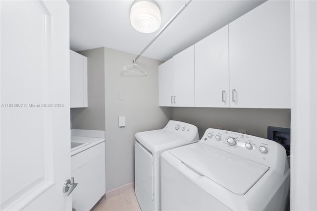 2000 Island Blvd Unit 2409, Aventura, FL 33160 - washroom with cabinet space and washing machine and clothes dryer