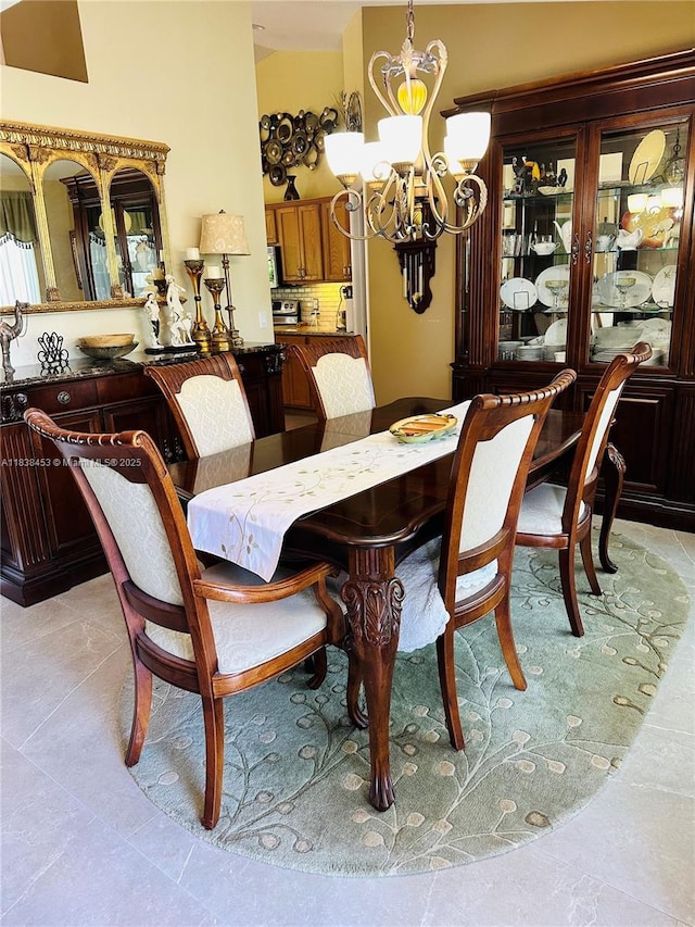 dining space featuring a chandelier