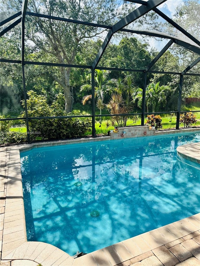 outdoor pool with glass enclosure
