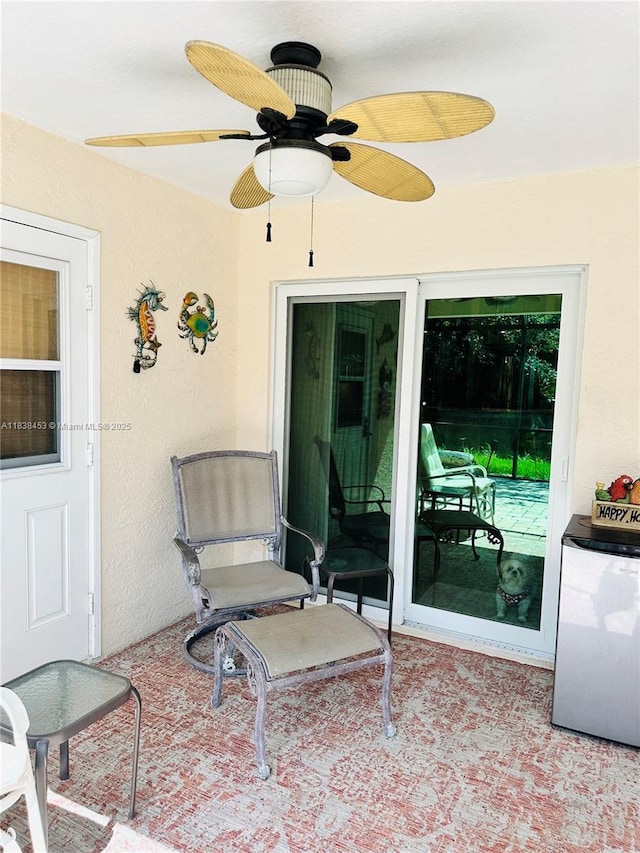 view of patio featuring a ceiling fan