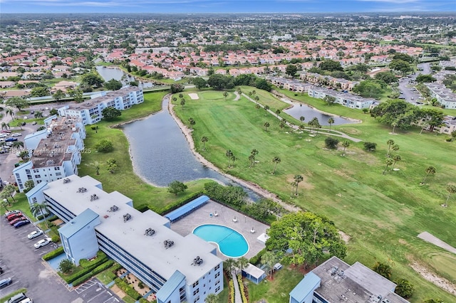 7684 NW 18th St Unit 202, Margate, FL 33063 - drone / aerial view of a large body of water and a golf club