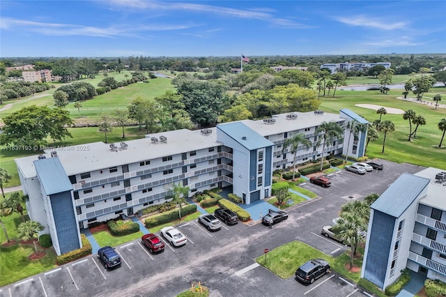 7684 NW 18th St Unit 202, Margate, FL 33063 - drone / aerial view of a local golf course and a nearby body of water
