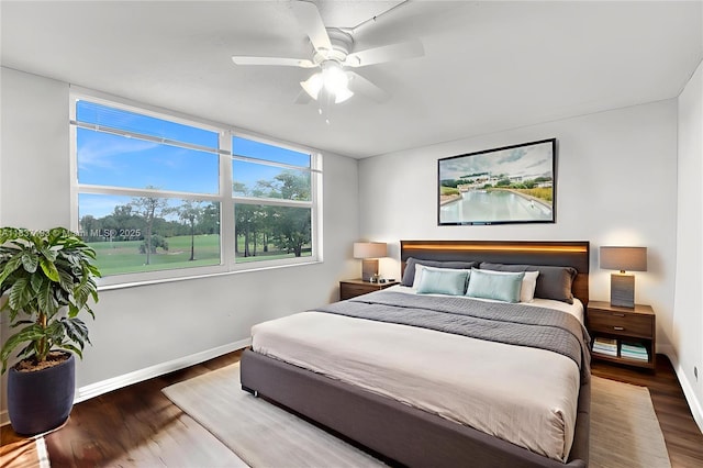 7684 NW 18th St Unit 202, Margate, FL 33063 - bedroom featuring wood finished floors and a ceiling fan