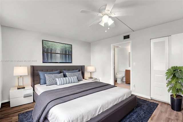 7684 NW 18th St Unit 202, Margate, FL 33063 - bedroom featuring wood finished floors, a ceiling fan, and ensuite bathroom