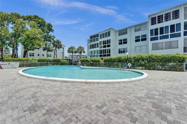 7684 NW 18th St Unit 202, Margate, FL 33063 - community pool with a patio area