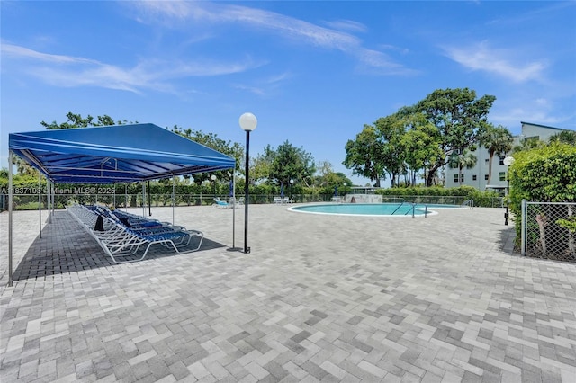 7684 NW 18th St Unit 202, Margate, FL 33063 - community pool featuring a patio area
