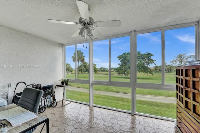 7684 NW 18th St Unit 202, Margate, FL 33063 - sunroom with ceiling fan, plenty of natural light, and golf course view
