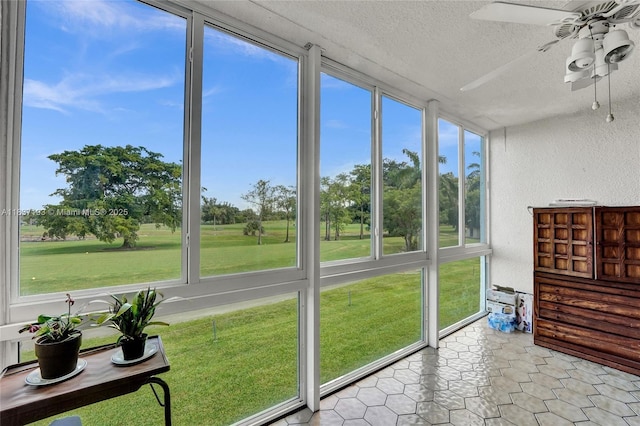 7684 NW 18th St Unit 202, Margate, FL 33063 - sunroom with plenty of natural light and a ceiling fan