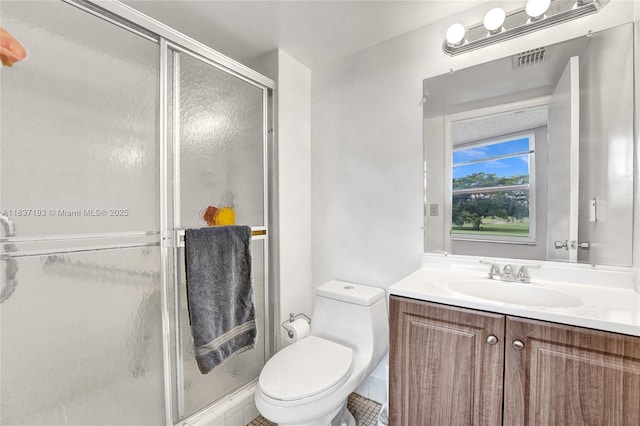 7684 NW 18th St Unit 202, Margate, FL 33063 - bathroom featuring vanity, a shower stall, and tile patterned floors