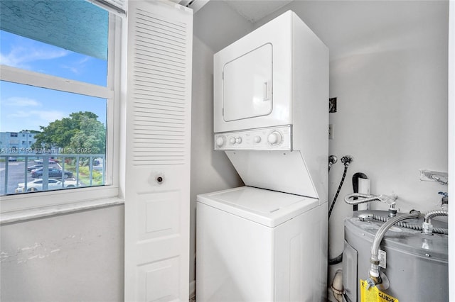 7684 NW 18th St Unit 202, Margate, FL 33063 - laundry area with stacked washer / dryer
