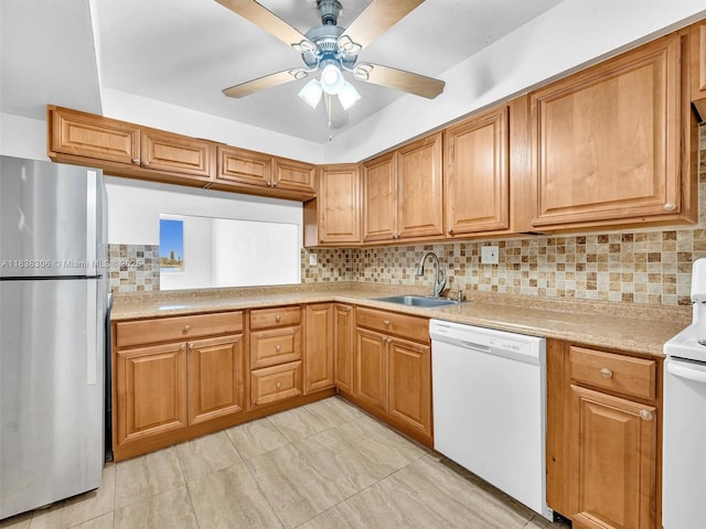 1170 NE 191st St Unit 24, Miami, FL 33179 - kitchen featuring white appliances, tasteful backsplash, light countertops, ceiling fan, and brown cabinetry