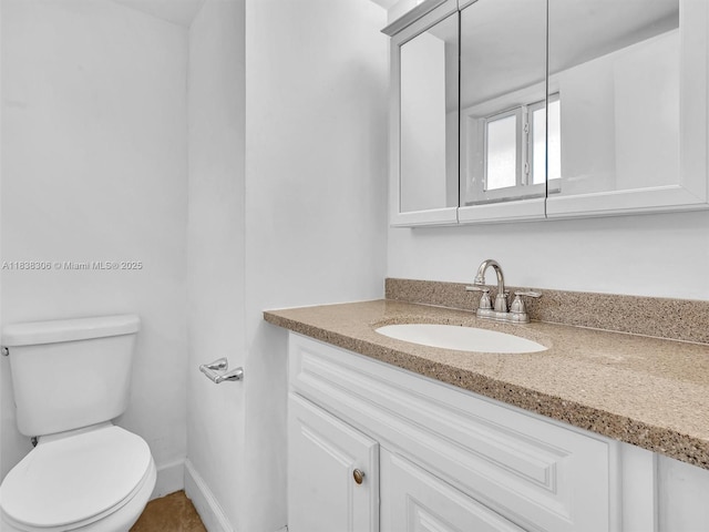 1170 NE 191st St Unit 24, Miami, FL 33179 - bathroom featuring vanity and toilet