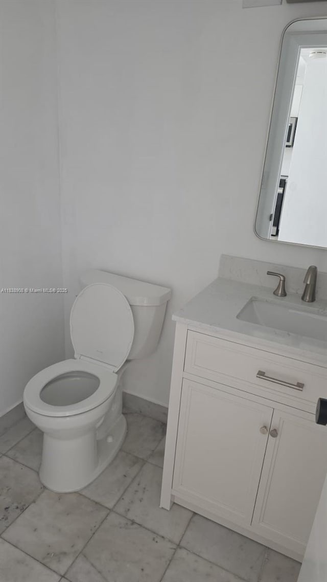 1450 Brickell Bay Dr Unit 1402, Miami, FL 33131 - half bath featuring toilet and vanity