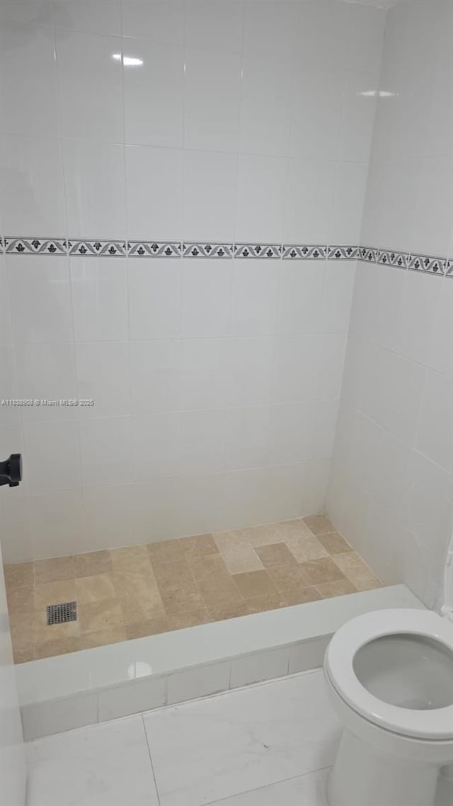1450 Brickell Bay Dr Unit 1402, Miami, FL 33131 - full bathroom featuring tiled shower