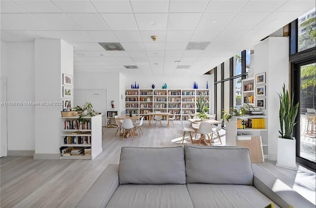 1450 Brickell Bay Dr Unit 1402, Miami, FL 33131 - living area with wood finished floors and a paneled ceiling