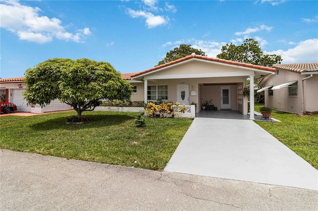 5723 NW 86th Ave, Tamarac, FL 33321 - single story home with a carport, a front yard, and concrete driveway