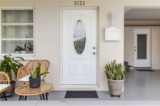 5723 NW 86th Ave, Tamarac, FL 33321 - doorway to property with stucco siding
