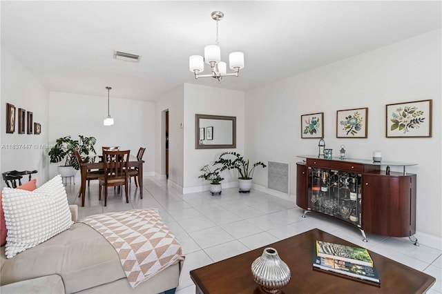 5723 NW 86th Ave, Tamarac, FL 33321 - living area with a chandelier and light tile patterned flooring