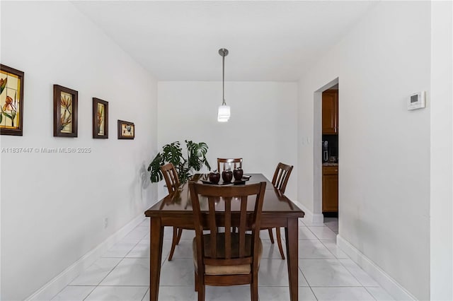 5723 NW 86th Ave, Tamarac, FL 33321 - dining space featuring baseboards