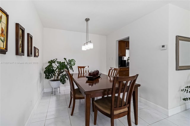 5723 NW 86th Ave, Tamarac, FL 33321 - dining space with baseboards