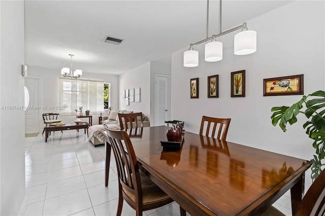 5723 NW 86th Ave, Tamarac, FL 33321 - dining area with a chandelier and light tile patterned flooring