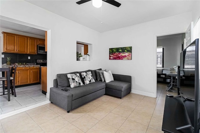 5723 NW 86th Ave, Tamarac, FL 33321 - living area with a ceiling fan and light tile patterned flooring
