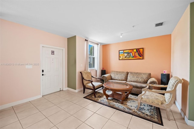 8079 W 36th Ave Unit 6, Hialeah, FL 33018 - living room with light tile patterned floors and baseboards