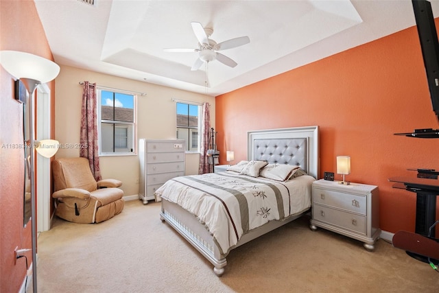 8079 W 36th Ave Unit 6, Hialeah, FL 33018 - bedroom featuring a raised ceiling, light carpet, and ceiling fan