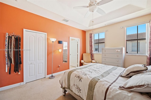 8079 W 36th Ave Unit 6, Hialeah, FL 33018 - bedroom with carpet floors, a tray ceiling, and ceiling fan