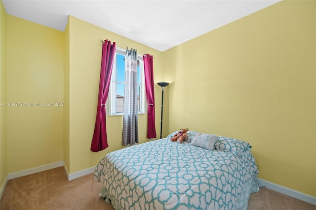8079 W 36th Ave Unit 6, Hialeah, FL 33018 - carpeted bedroom featuring baseboards