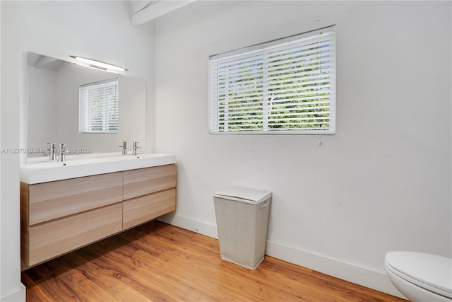 5308 Riviera Dr, Coral Gables, FL 33146 - bathroom with double vanity and wood finished floors