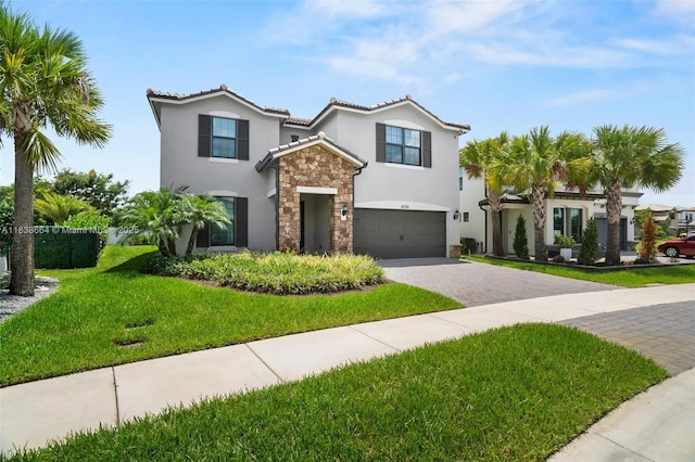 8036 NW 78th St, Tamarac, FL 33321 - view of front facade featuring stucco siding, decorative driveway, stone siding, an attached garage, and a front lawn