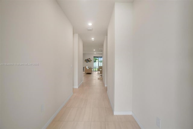 8036 NW 78th St, Tamarac, FL 33321 - hallway featuring light tile patterned floors and recessed lighting